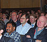 UKRC promotional photo showing Dr Golding and myself in the audience at the UKRC, listening to Lord Darzi give the BIR Agfa Mayneord lecture